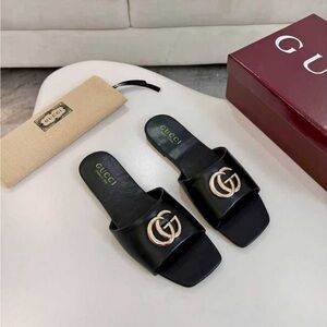 Gucci Women's Black Leather GG Slide Sandals